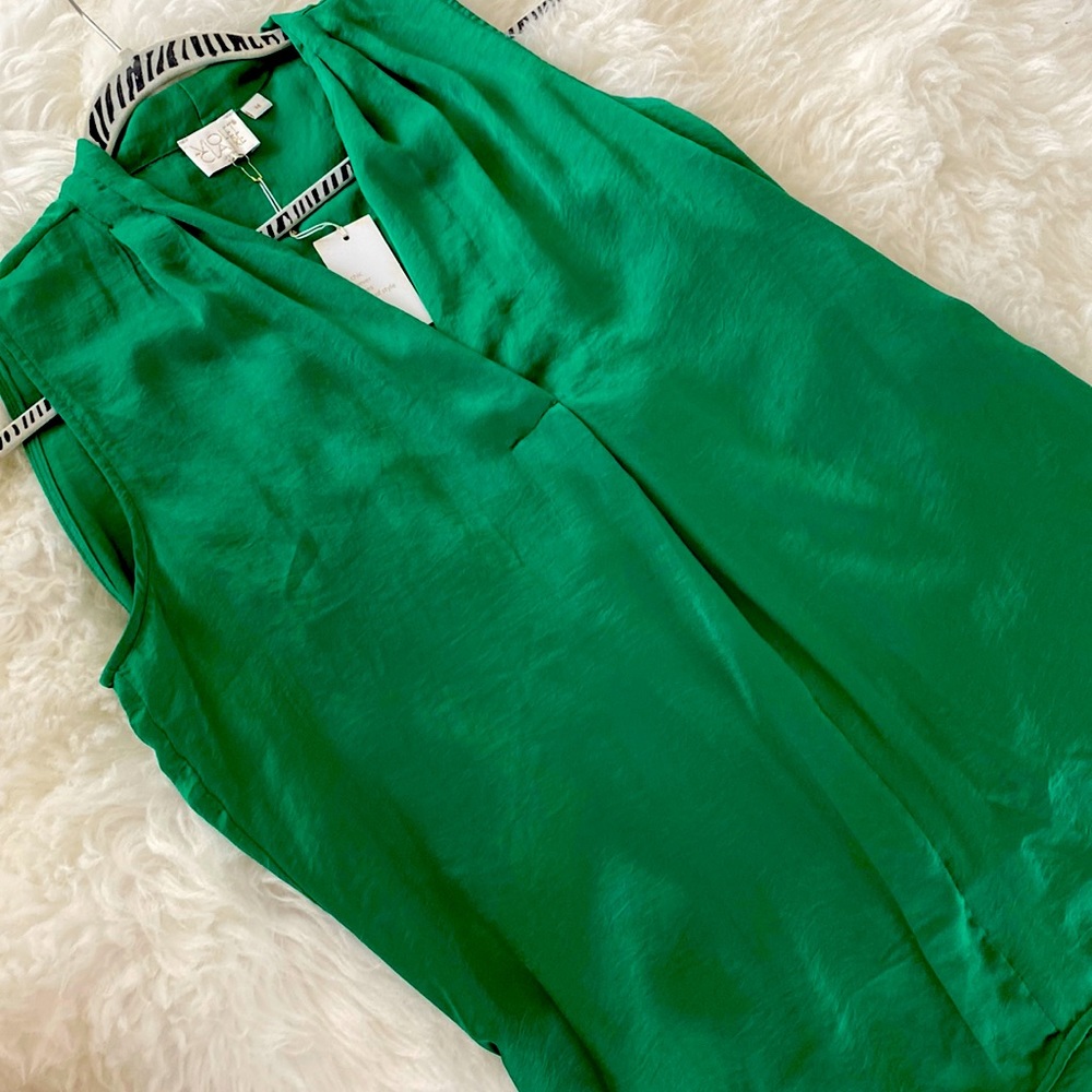 Emerald color top.